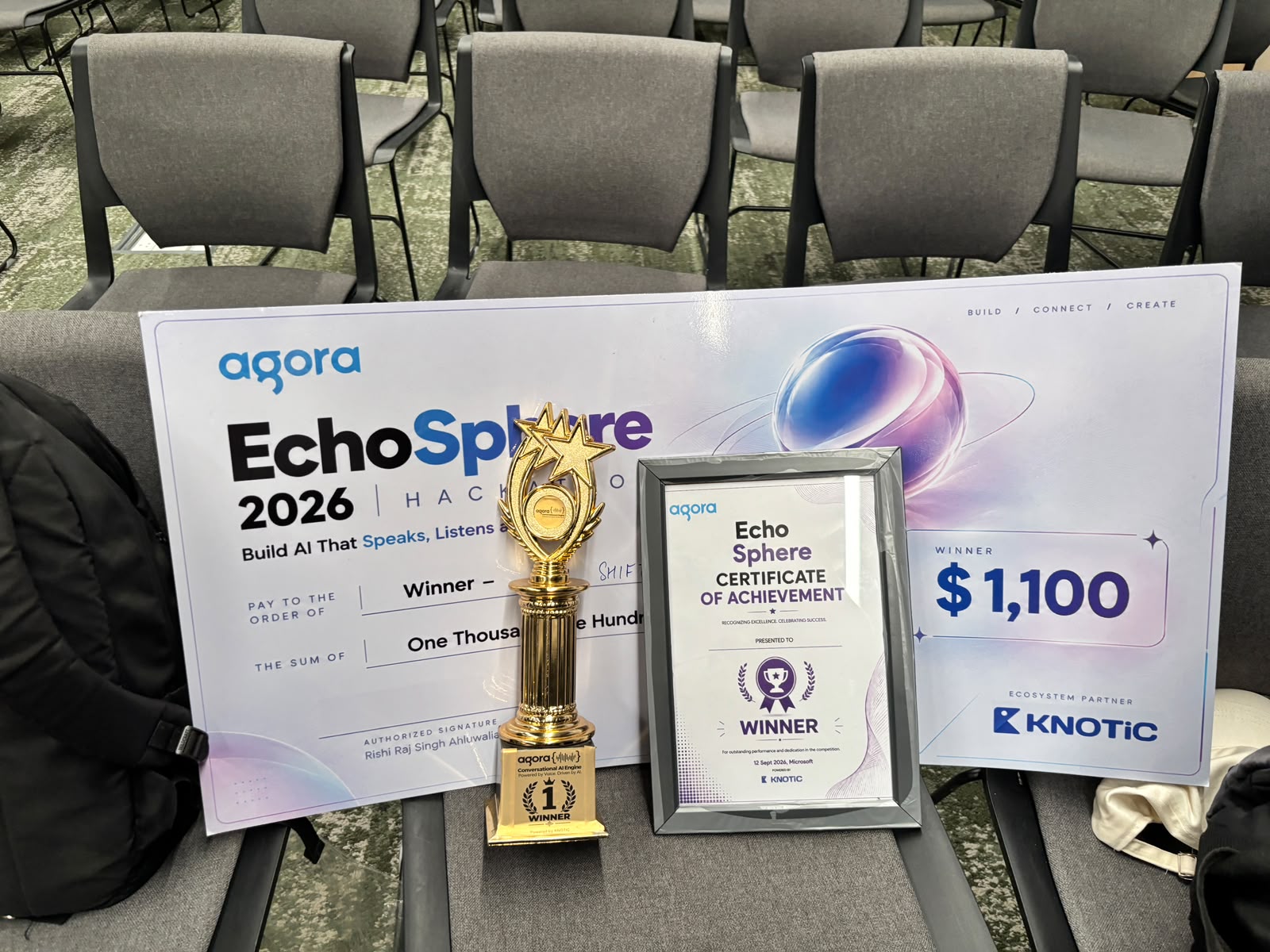 EasyEV team trophy, certificate and winner cheque at the Agora Ecosphere 2026 finale
